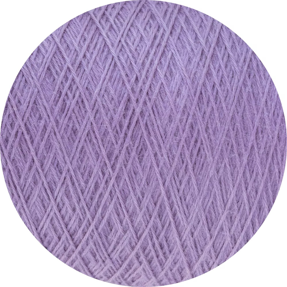 Ball of purple yarn on a white background